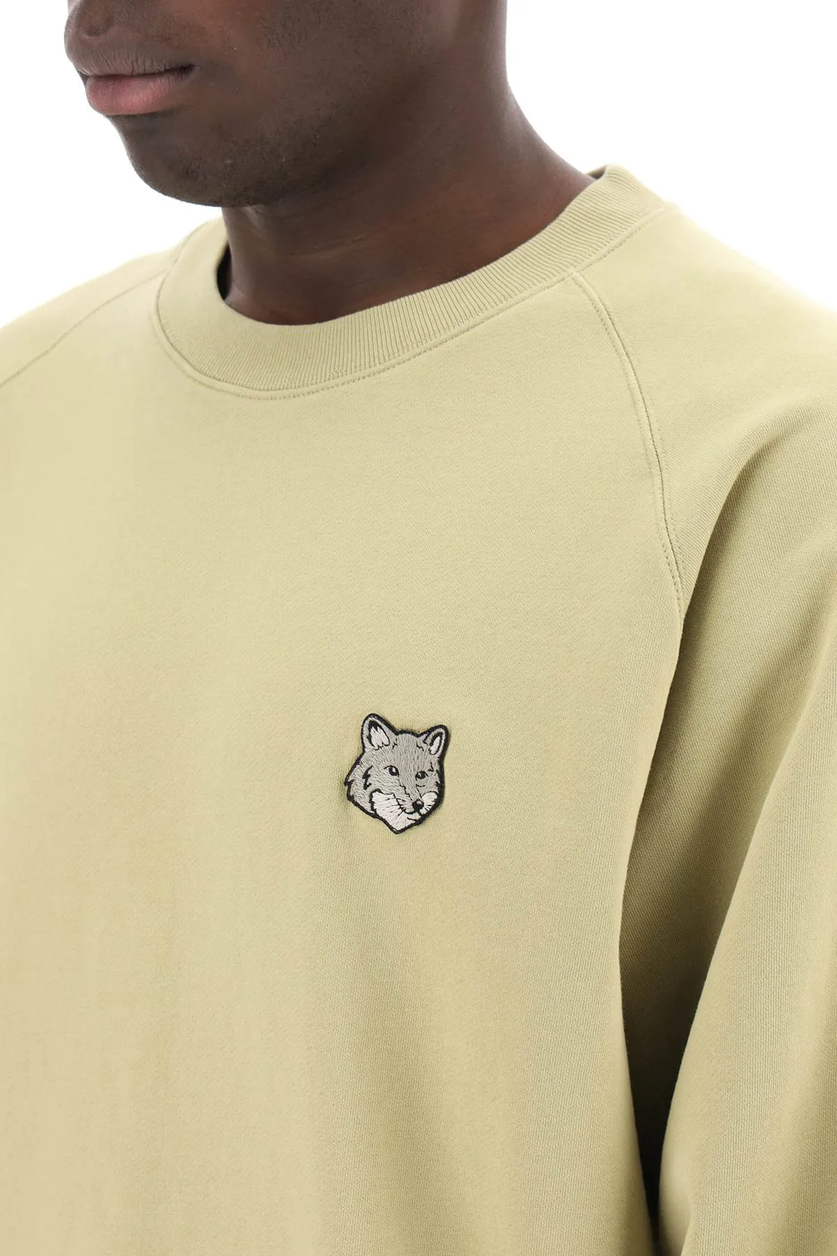 bold fox head crewneck sweatshirt with patch
